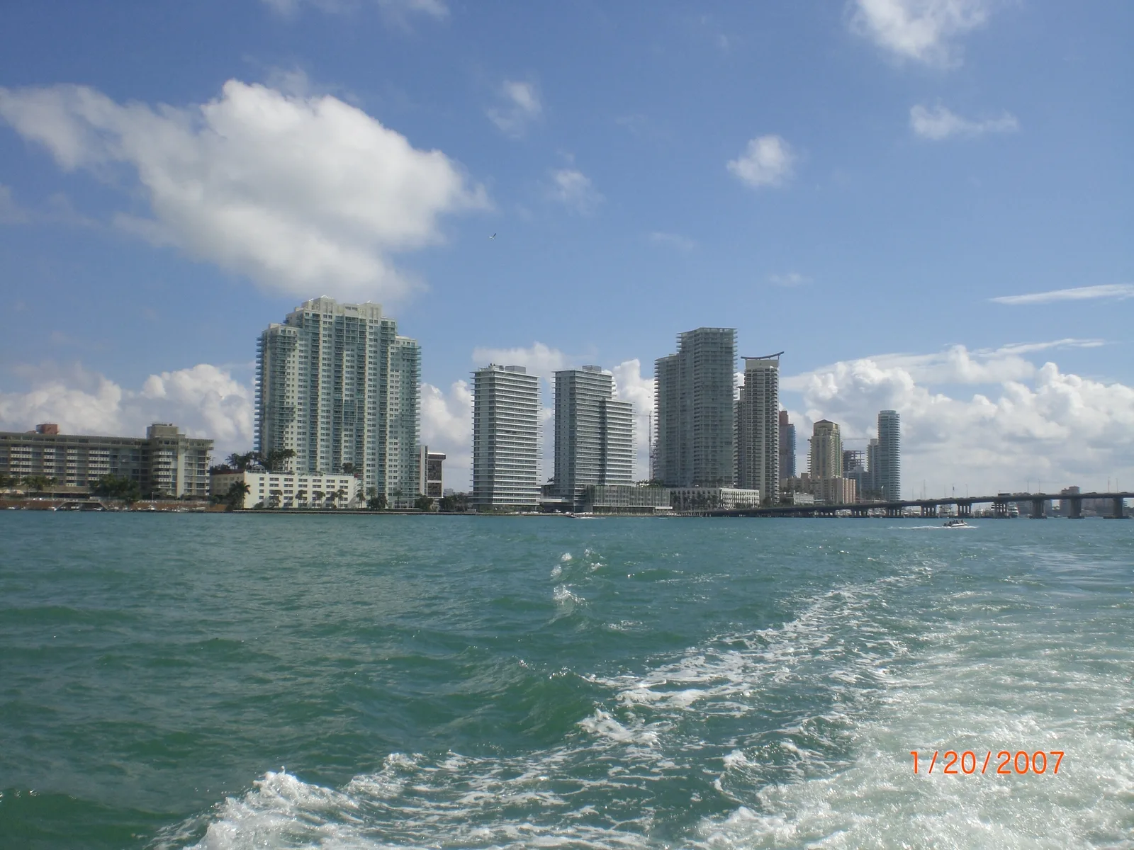 A boat running along a Florida coastline